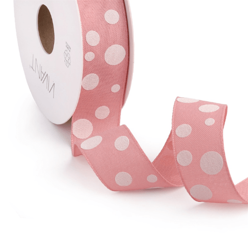 Rol roze lint met witte stippen