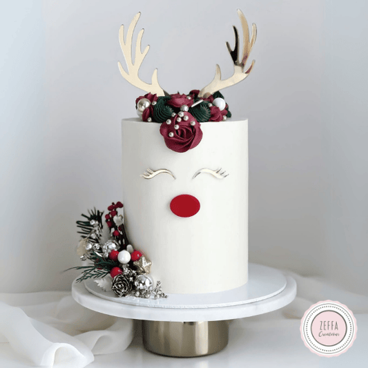 Kersttaart op een wit cakeboard van 25 cm