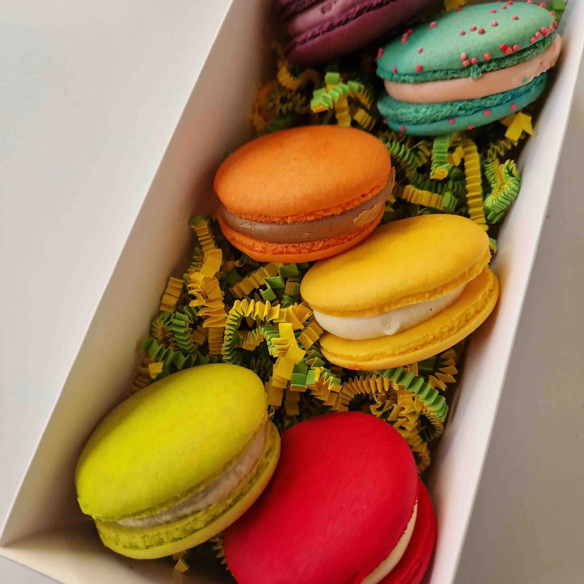Opvulmateriaal zigzag - mix groen/geel(1 kg) - Cupcakedozen.nl